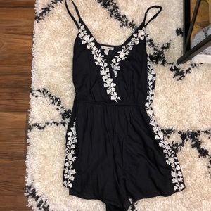 black and cute white flower romper